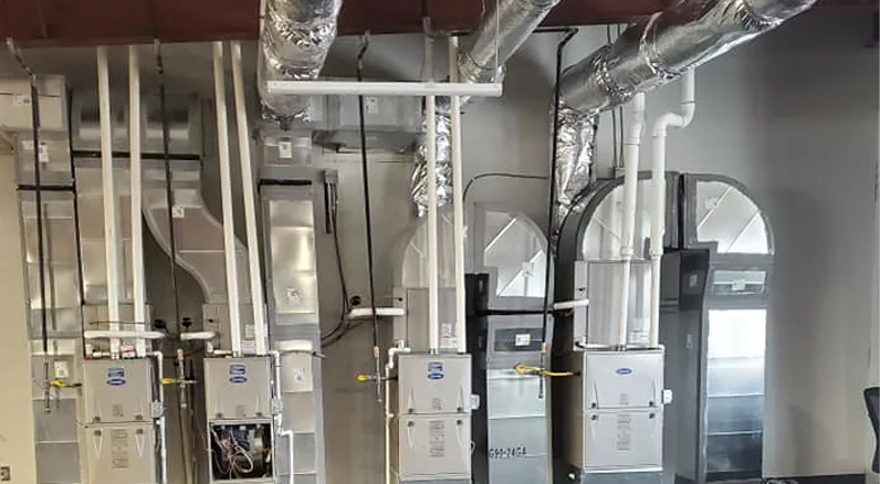 hvac units lined up against a wall